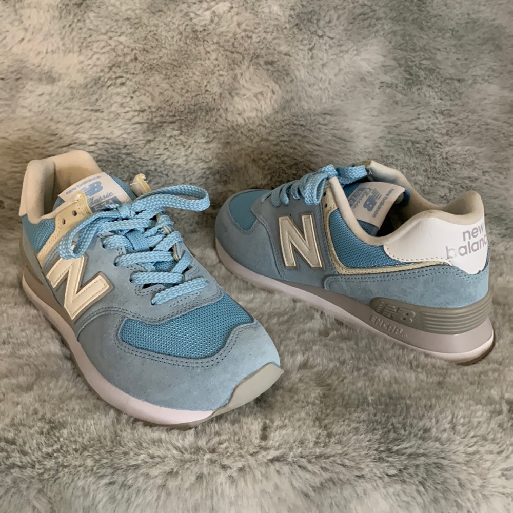 New, never worn light blue and gray New Balance sneakers